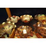 A group of six carnival lustre glass bowls with fluted rims fruit berry and floral decoration