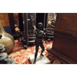 A spelter figure of a javelin thrower on marble base