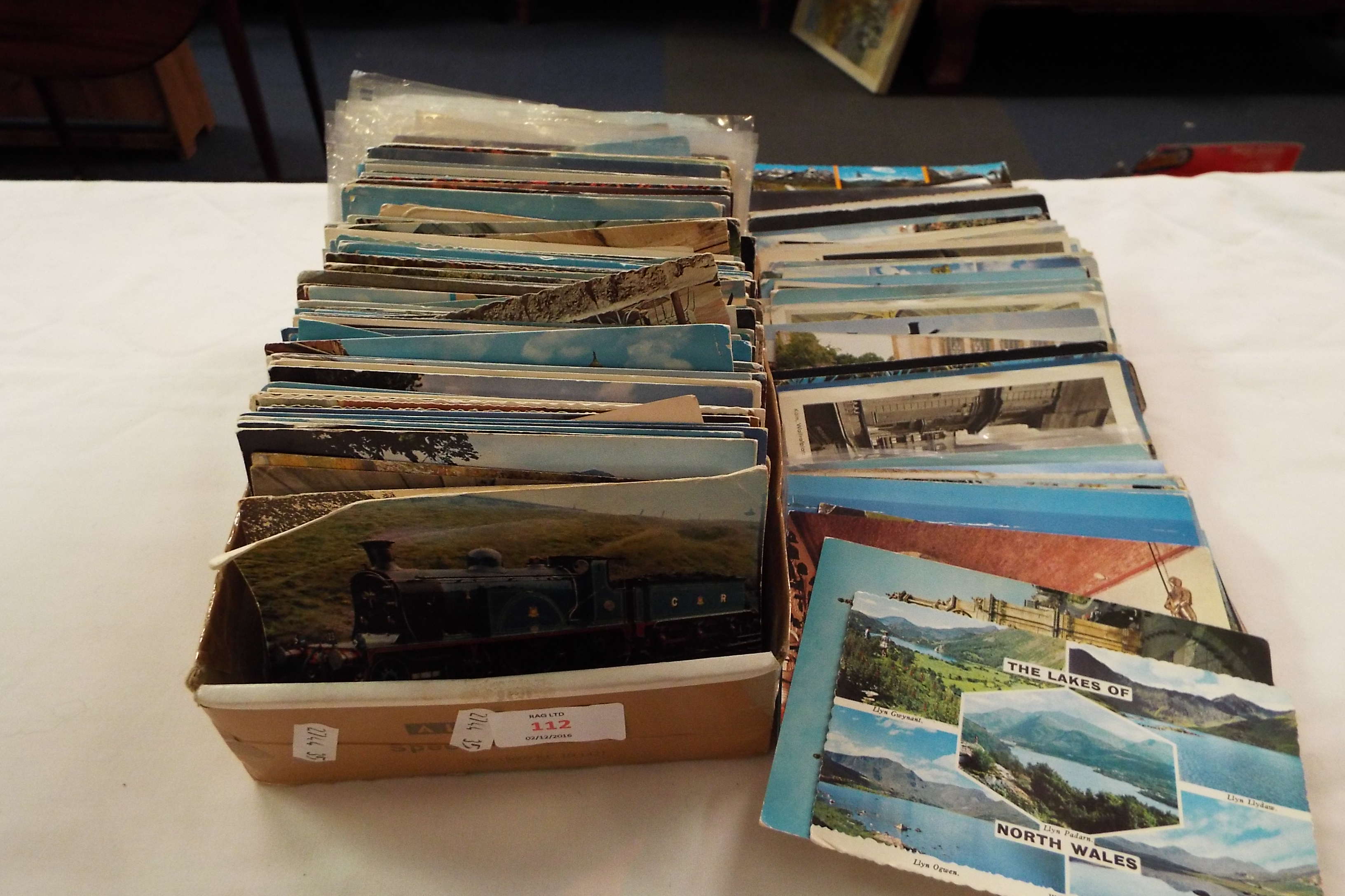 A mixed selection of 20thC postcards to include trams, novelty,