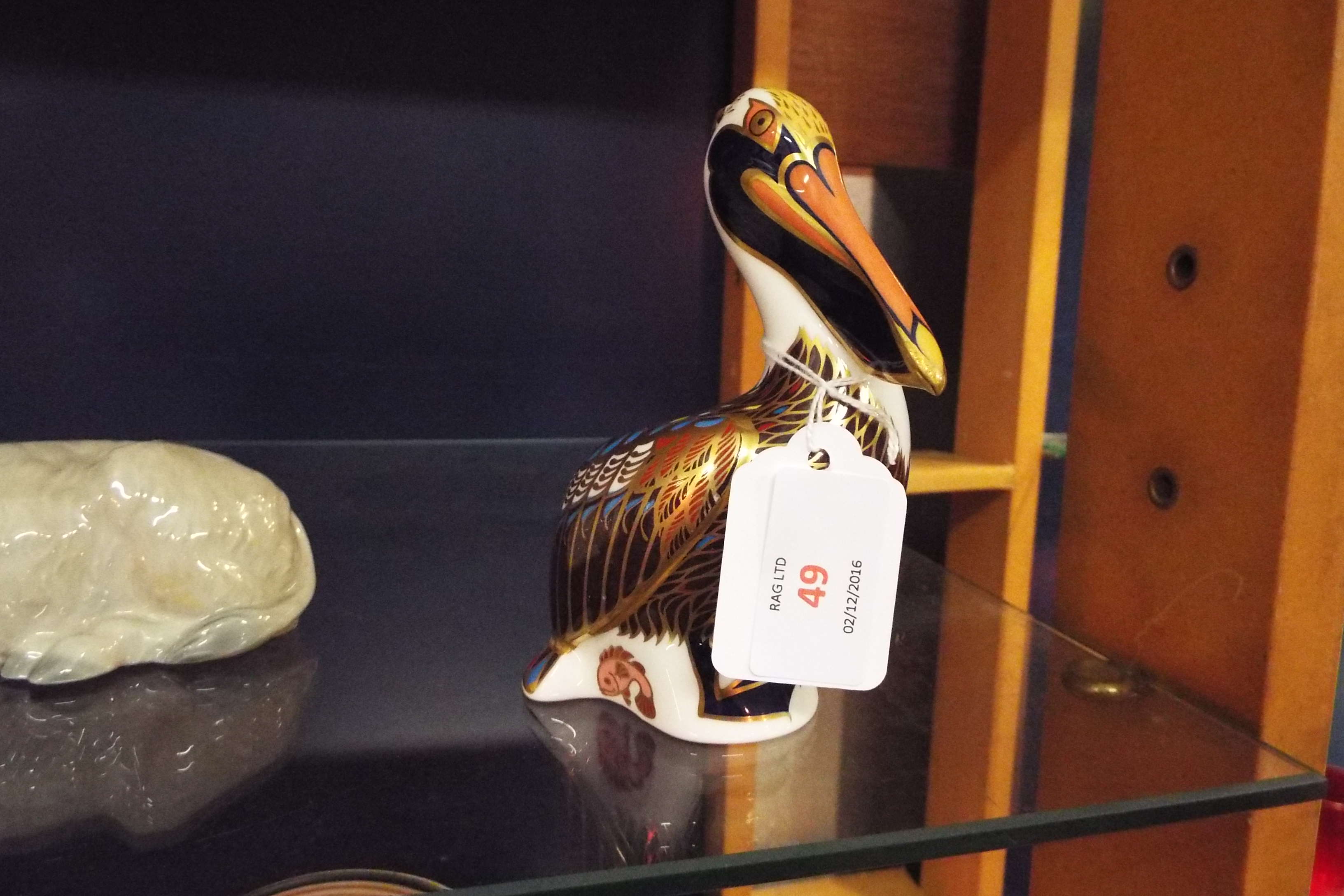 A Royal Crown Derby Imari pattern paperweight in the form of 'Brown Pelican',