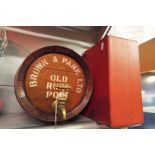 A mid-20thC fitted picnic hamper together with a coopered spirit barrel for Brown & Pank Old Ruby