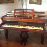 A circa 1872 John Broadwood & Sons of London rosewood framed 7ft baby grand piano resting on turned