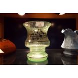 A frosted glass vase having coaching scene