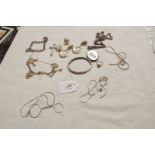 A quantity of silver jewellery to include bangles, locket,