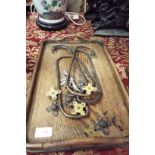 An early 20thC copper bound oak twin handled tray together with a collection fo brass door