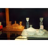 An orange glass and blue glass dressing table set