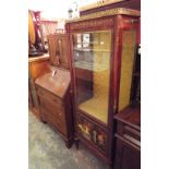 A stained wood gilt ormolu vitrine the glass panel door above a painted panel resting on turned and