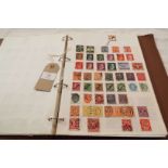 A Stanley Gibbons stamp album containing stamps of the world some war-time Germany