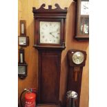 A Victorian mahogany cased grandfather clock having painted dial with Roman numerals for