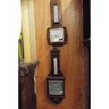 Two mid-20thC oak cased aneroid barometers,