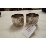 A pair of 800 silver drum shaped napkin rings 800 silver, there are some dents,