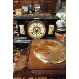 A Victorian faux slate mantel clock, the ivorine dial with brass bezel and Roman numerals,