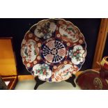 A large late 20thC famille rose Imari design Chinese charger