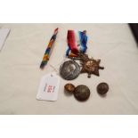 A WWI 1914/15 Star and British War medal along with buttons etc to 'Pte W.T. Brain' R.A.M.C.