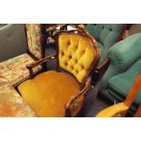 A French style walnut button-back open armchair with serpentine over stuffed seat,