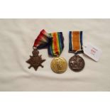 A WWI 1914/15 Star, British War and Victory medal to 'Pte J.J.