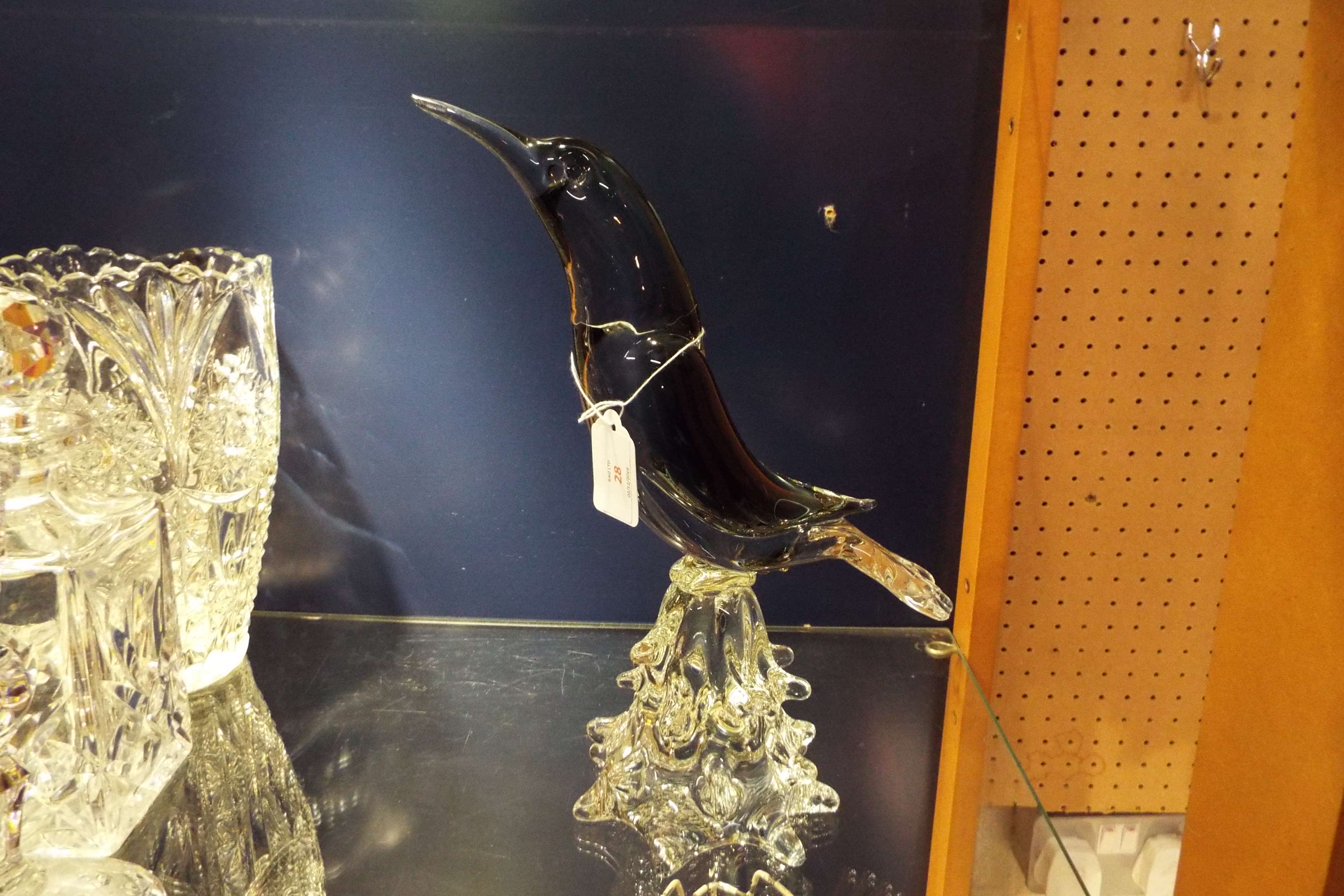 A large Murano style diving bird on heavy glass base slight ship to beak