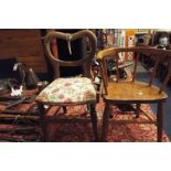 An early 20thC child's walnut bow back armchair together with a child's balloon back chair