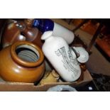 A quantity of stoneware salt glazed flagons, foot warmers and jars,