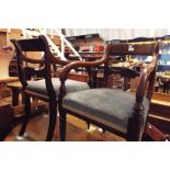 A set of five Victorian chairs including two carvers having carved splat back resting on turned