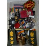 Quantity of various assorted military items in one box including cap badges, lapel badges,