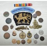 Selection of various military cap badges including Veterinary Corp, TA lapel badge,