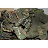 Box containing a selection of various military surplus including webbing,