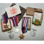 Selection of WWII medals with original postage boxes and additional packaging with certificates of