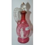 Mary Gregory cranberry claret jug with hand painted enamel decoration depicting young girl