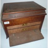 Mahogany sewing box with sectioned compartment to the top and two pullout drawers behind fall front