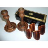 Pair of oak candlesticks,