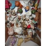 Selection of ceramic animals, bisque figurines, horn birds, two bisque cake decorations etc.