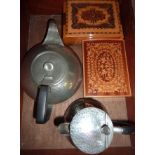 Hammered pewter teapot and water jug and two inlaid wooden boxes in oak tray