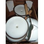 Three cast iron Salter saucepans and lids