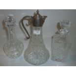 Pressed glass claret jug and two cut glass decanters