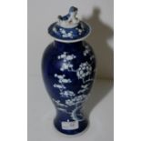 Chinese vase with prunus pattern and dog of foe finial