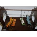 Painted wooden swing boat model