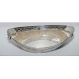 Silver plated oval dish with ring handles and pierced decoration