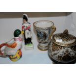 Soldier figurine, a duck jug, lidded pot,