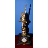 Statue mantel clock in cast metal case crested with figure of man holding aloft a torch mounted on