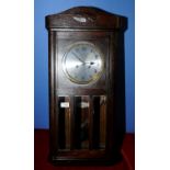 Oak cased wall clock with brass and steel face and striking movement with plaque Fontenoy &