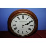 Oak cased round head wall clock,