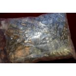 Bag containing a large selection of various watch parts,