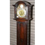 Brass and steel faced oak cased grandmother clock with arched pediment and barley twist column