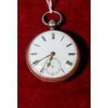 Silver hallmarked open face pocket watch with white enamel dial and brass hands,