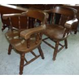 Pair of captains style chairs with double H shaped under stretchers