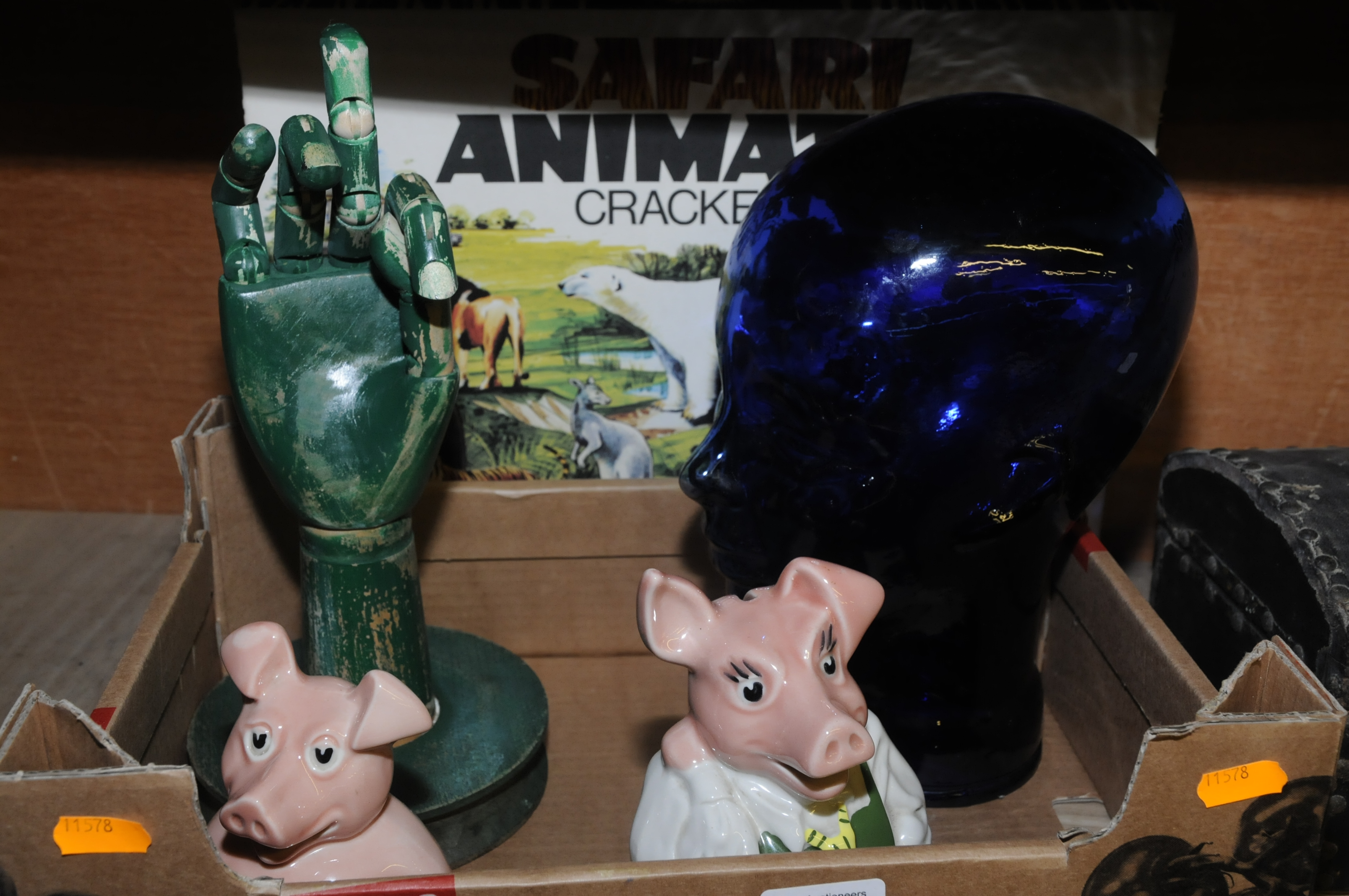 Two Natwest pigs with stoppers, glass head,