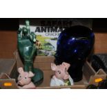 Two Natwest pigs with stoppers, glass head,