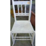 Painted rocking chair with cane strung seat