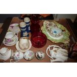 Box of decorative ceramics and glass including cranberry glass jug, oriental tea bowls,